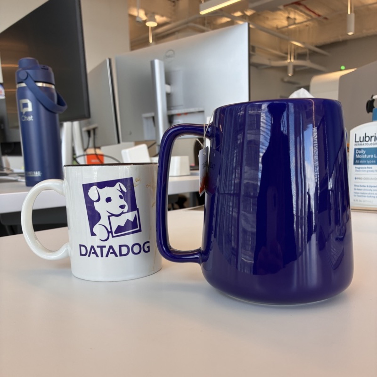 A large 24oz deep blue ceramic mug